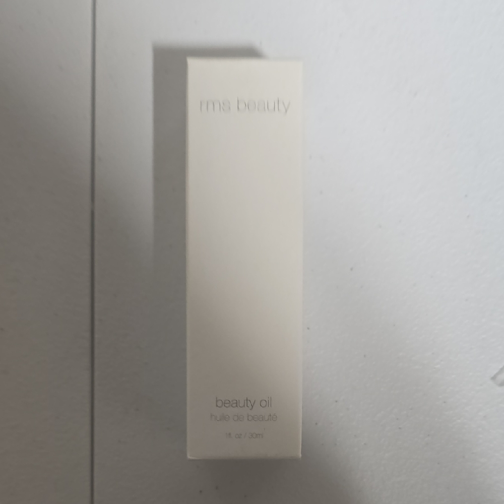 RMS Beauty Oil in Elegant Cream Packaging